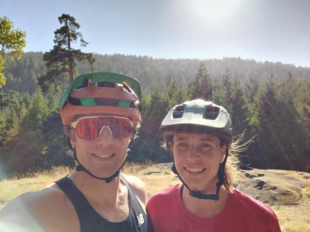 Kate and Cody posing for a photo while out mountain biking