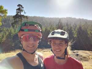 Kate and Cody posing for a photo while out mountain biking